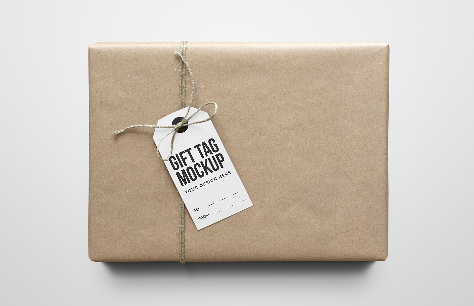 Download Gift Tag On Craft Paper Package Mockups Medialoot